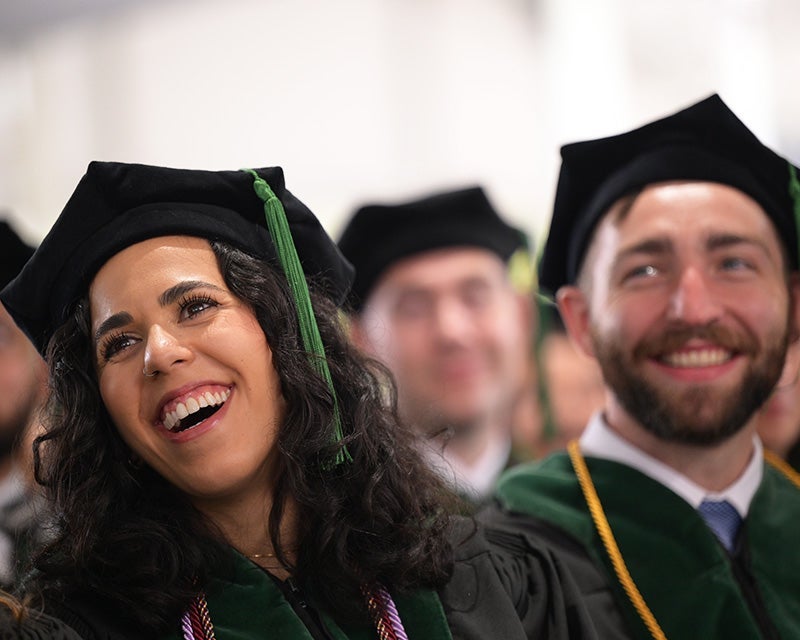 Students during the School of Medicine commencement in academic regalia
