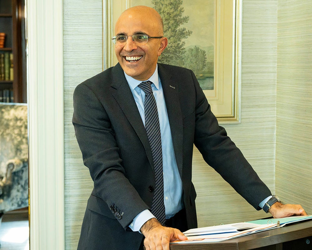 Jay Khanna speaks from a podium