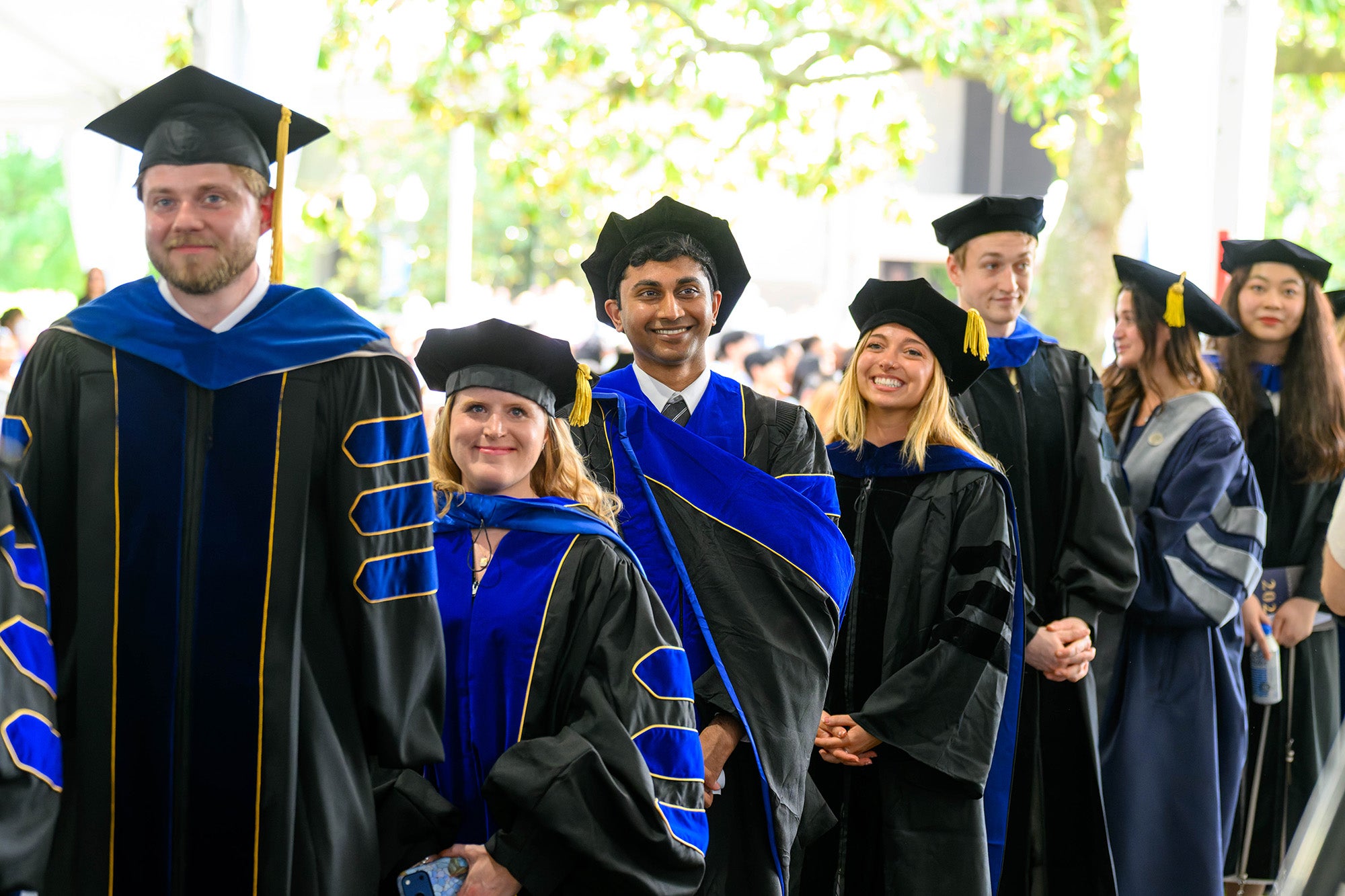 BGE grads stand in line