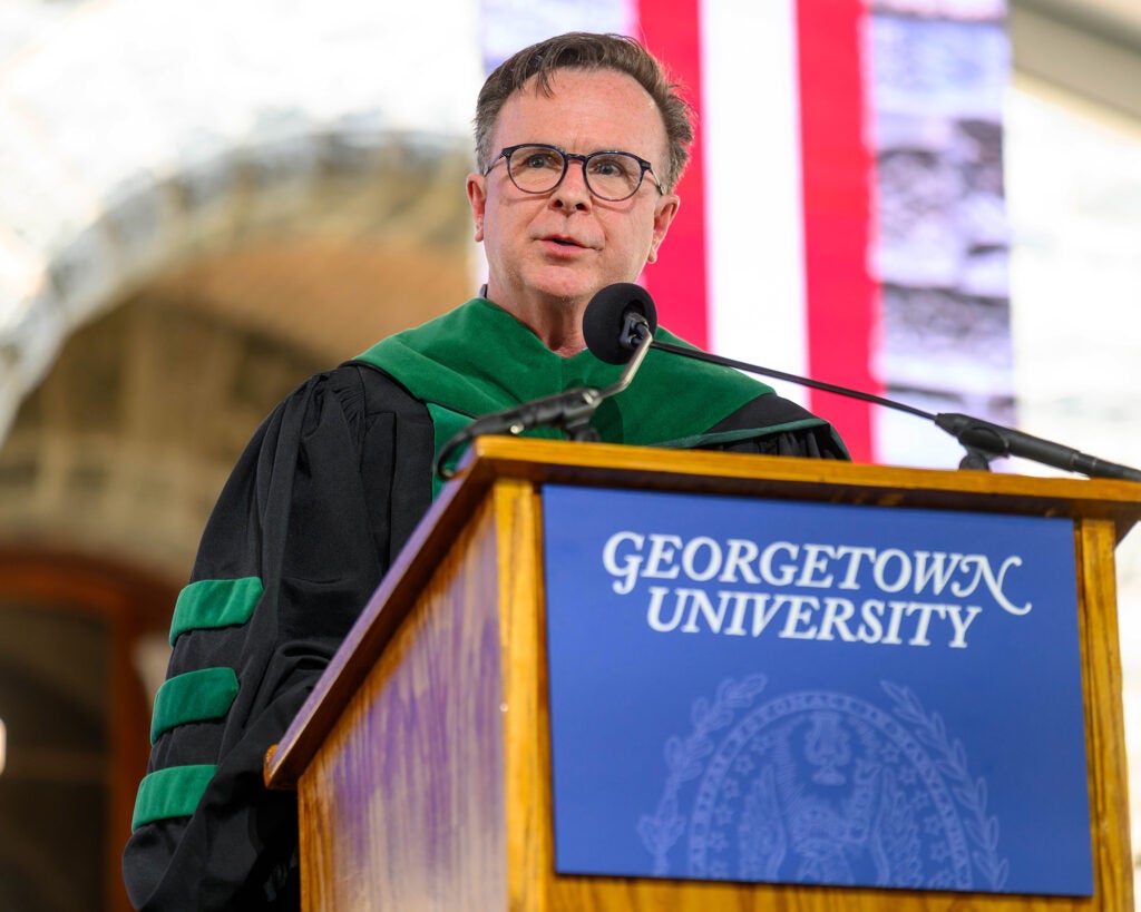 Dr. Beauchamp speaks from a podium