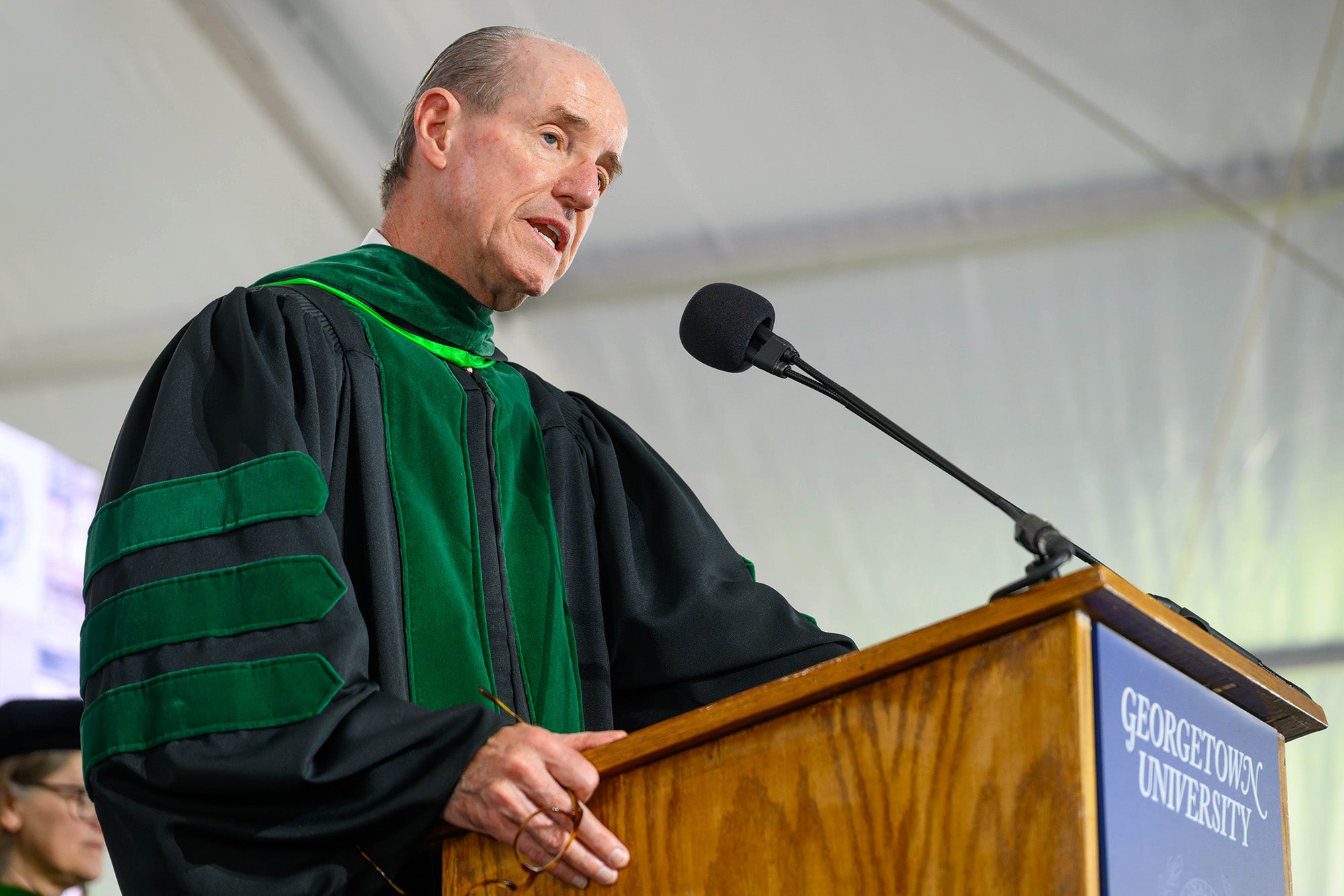 Steven R.T. Evans speaks from a podium